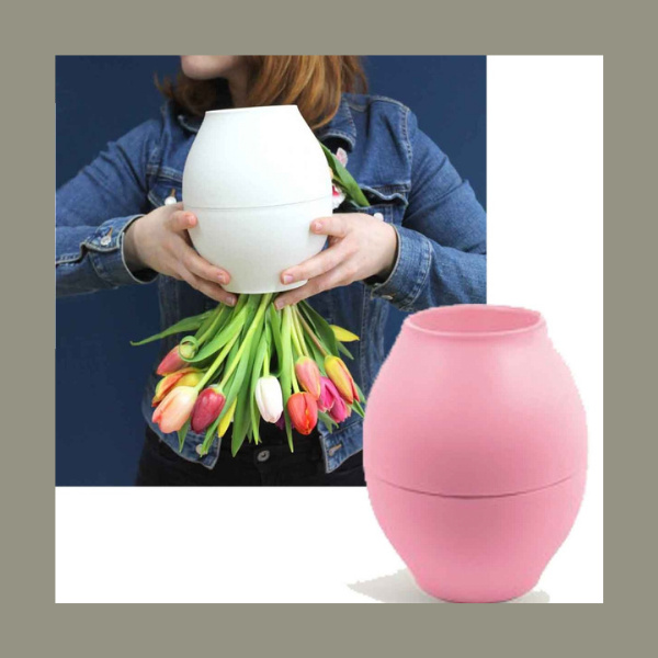Blumenstrauß in einer Vase die mit frischen Wasser versendet werden kann.